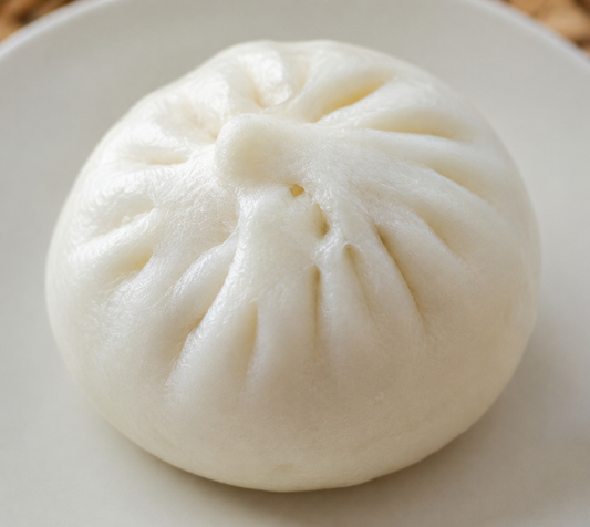 Why Pau Has That “Pinched Crown” on Top: The Hidden Engineering Behind Dim Sum You Never Noticed